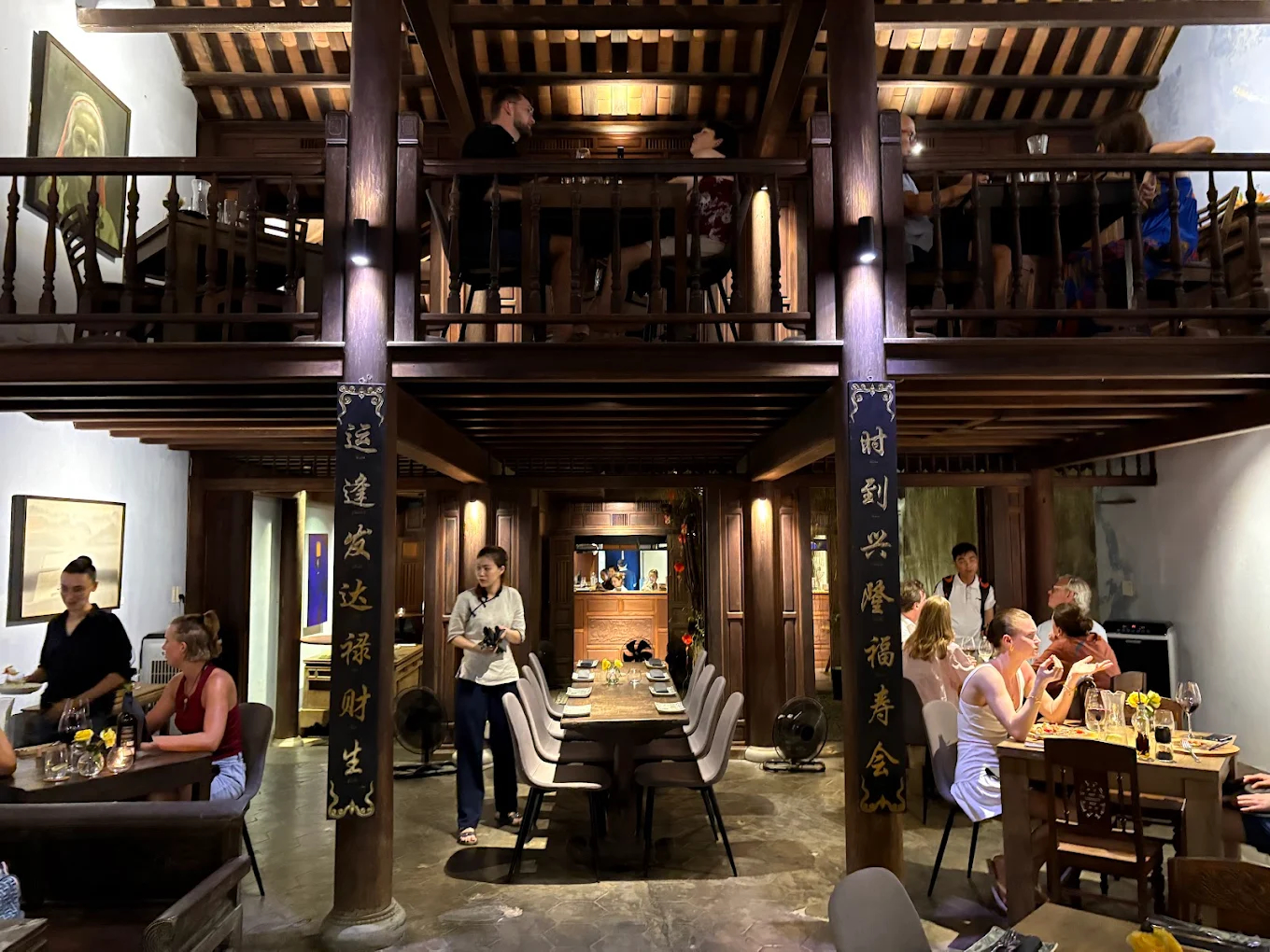 The restaurant’s cozy interior features wooden accents that enhance the dining experience